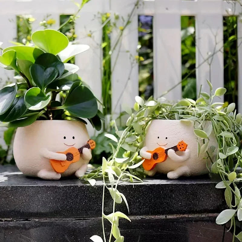 My New Favorite Plant Buddies: The Ukulele-Playing Planters