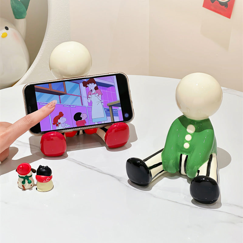 Abstract Cartoon Doll Sitting Figurine Phone Stand - Fun Home&Office Desktop Decoration Small Ornaments