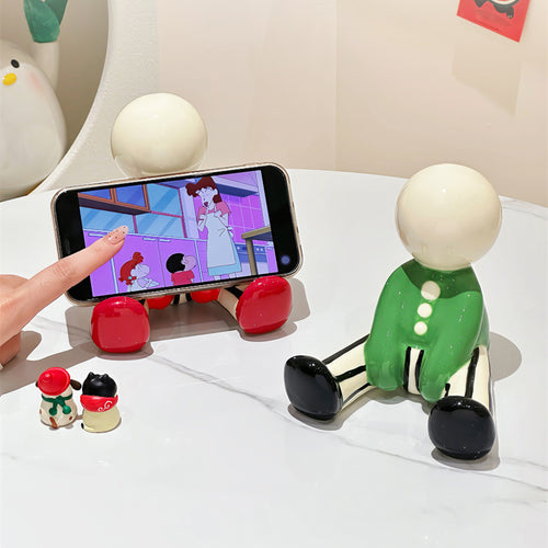Abstract Cartoon Doll Sitting Figurine Phone Stand - Fun Home&Office Desktop Decoration Small Ornaments